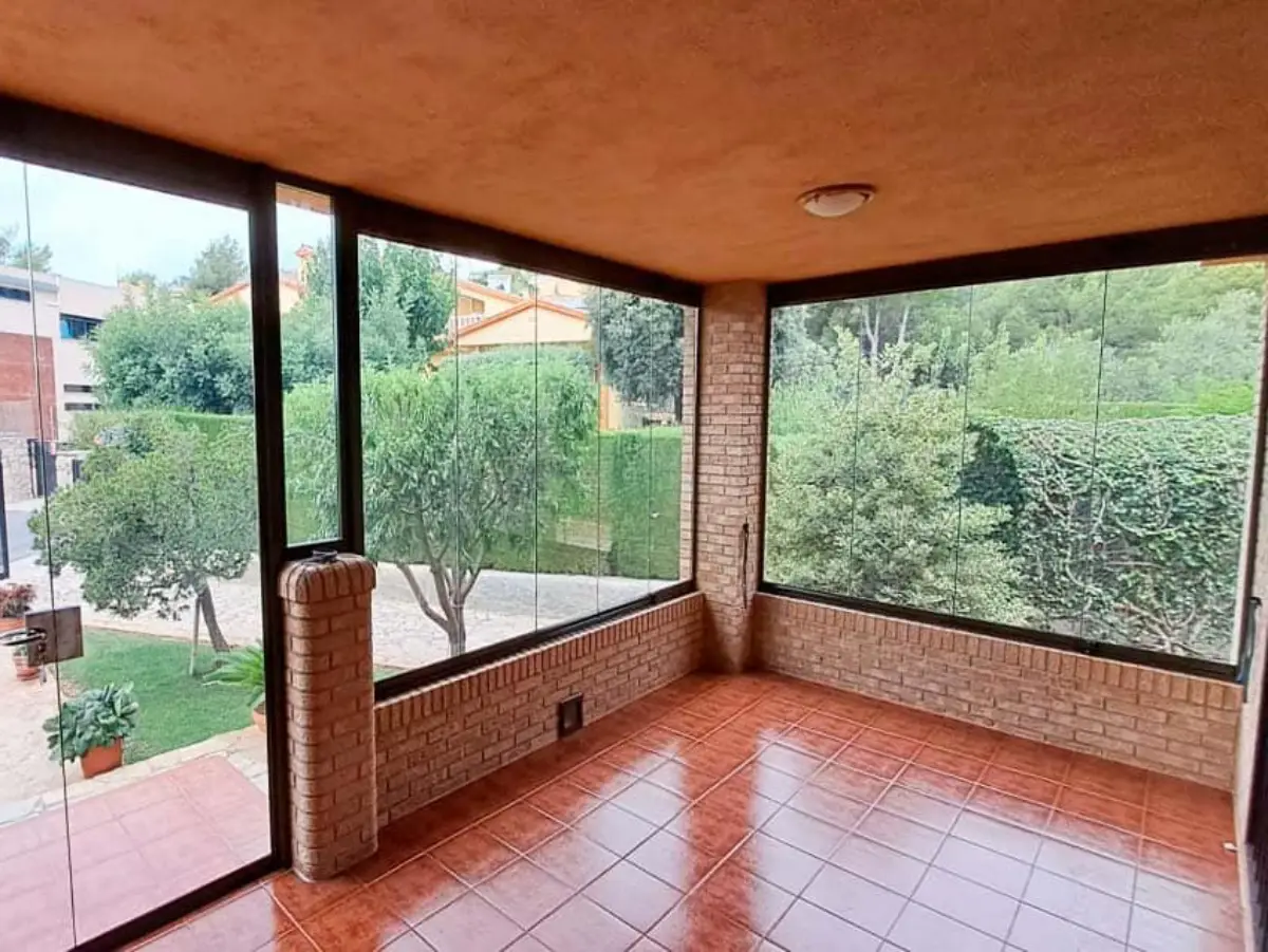Cerramiento patio cortinas de cristal